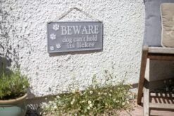 La Hacienda Beware Sign -Lawn and Plant Care Store 47065 2060